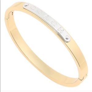 Gold embossed coach bangle